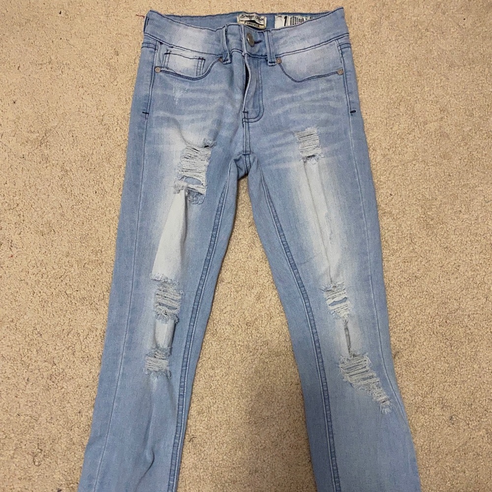 light washed high waisted ripped jeans